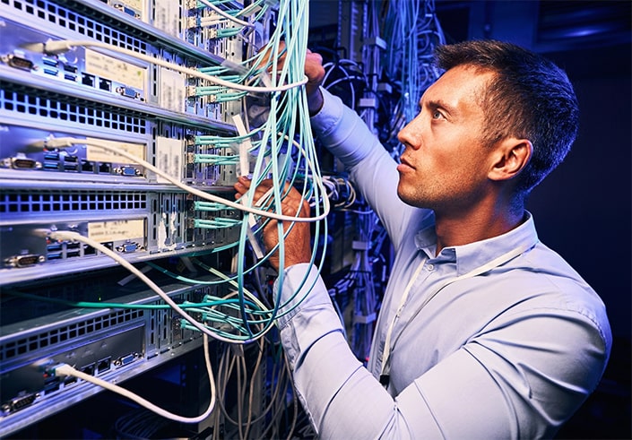 Man Working on Network Panel